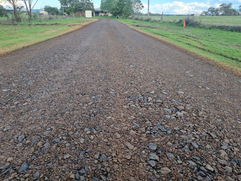 Freshly laid gravel driveway compacted and ready for use
